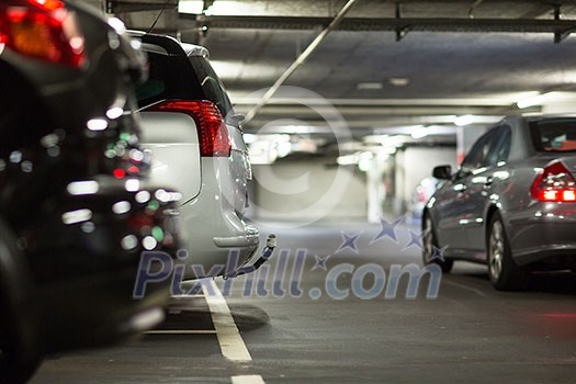 Underground parking/garage (shallow DOF; color toned image) Underground parking/garage (shallow DOF; color toned image)