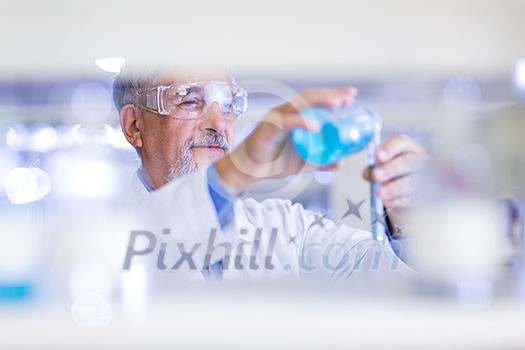 Senior male researcher carrying out scientific research in a lab (shallow DOF; color toned image) Senior male researcher carrying out scientific research in a lab (shallow DOF; color toned image)