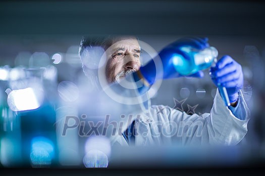 Senior male researcher carrying out scientific research in a lab (shallow DOF; color toned image) Senior male researcher carrying out scientific research in a lab (shallow DOF; color toned image)