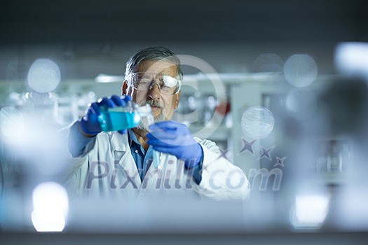 Senior male researcher carrying out scientific research in a lab (shallow DOF; color toned image) Senior male researcher carrying out scientific research in a lab (shallow DOF; color toned image)