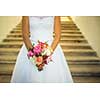 Lovely wedding bouquet in bride's hands