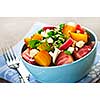 Bowl of roasted sliced red and golden beets