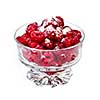 Fresh red raspberries in glass bowl isolated on white