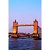 Tower bridge in London England at sunset over Thames river