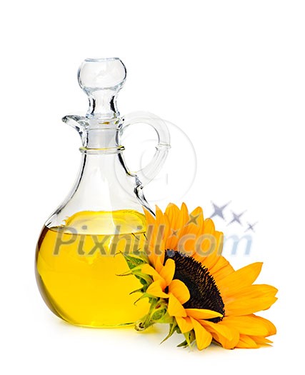 Sunflower oil bottle and flower isolated on white Sunflower oil bottle and flower isolated on white