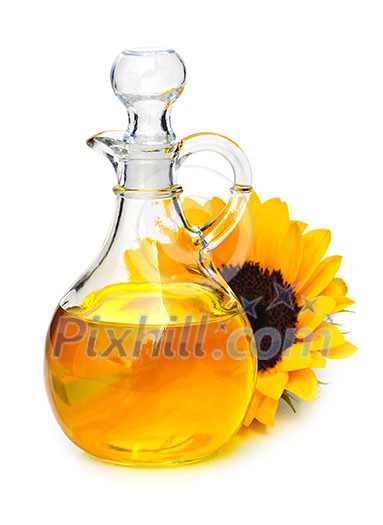 Sunflower oil bottle and flower isolated on white