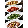 Herbal wellness dried tea in four bowls