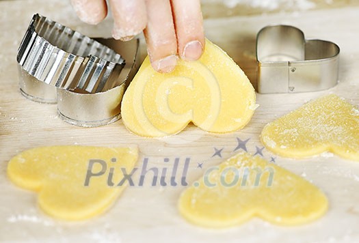 Making heart shaped shortbread cookies with cutters Making heart shaped shortbread cookies with cutters