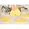 Making heart shaped shortbread cookies with cutters
