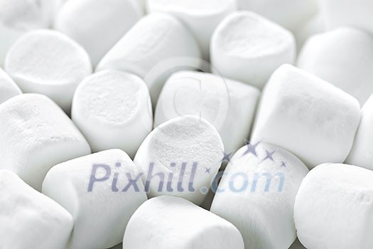 Close up of many plump sweet marshmallows Close up of many plump sweet marshmallows