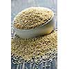 Closeup on pile of organic quinoa grain in bowl