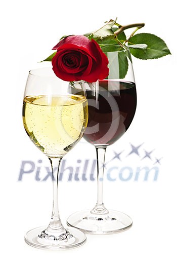 Romantic rose on top of red and white wine glasses isolated on white background
