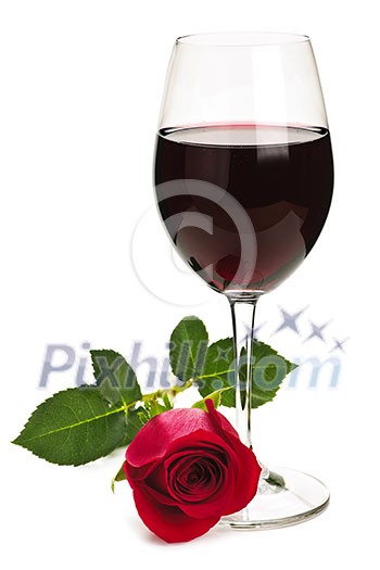 Romantic glass of red wine with long stemmed rose isolated on white background