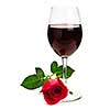 Romantic glass of red wine with long stemmed rose isolated on white background