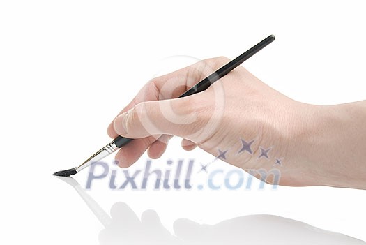 Hand holding brush isolated on white Hand holding brush isolated on white