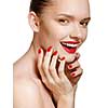 Young smiling woman with red lips and red nails, touching her face isolated on white background