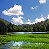 Summer landscape with mountains and blue lake