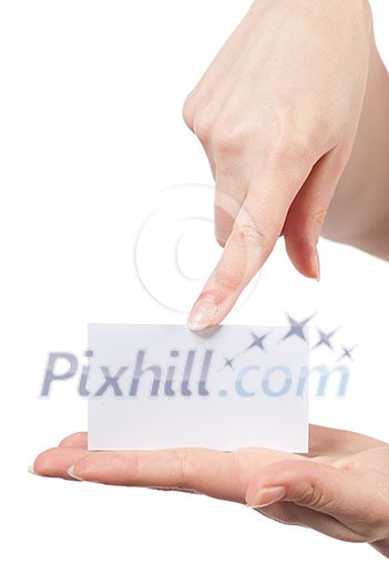 Womans hands holding and pointing empty visiting card isolated on white Womans hands holding and pointing empty visiting card isolated on white