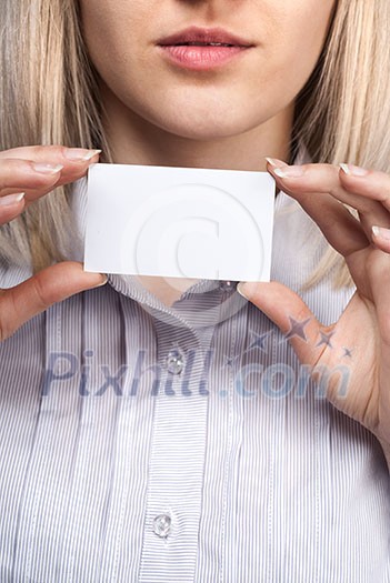 Woman hand holding empty visiting card Woman hand holding empty visiting card