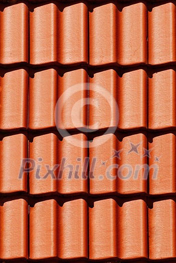Close-up orange tile on roof in carpathians castle Close-up orange tile on roof in carpathians castle