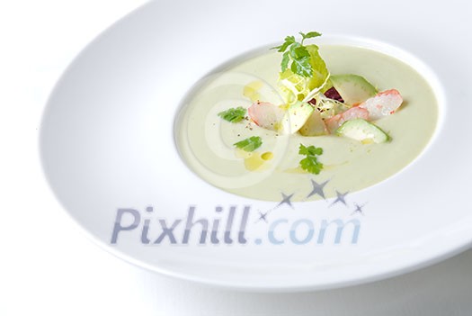 cold soup with crab on the plate