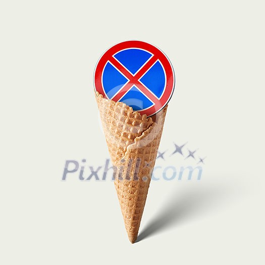 Waffle cornet with road sign isolated on white Waffle cornet with road sign isolated on white