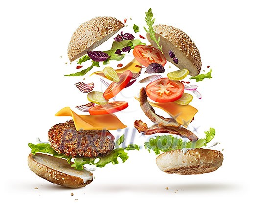 Two burgers with flying ingredients isolated on white background Two burgers with flying ingredients isolated on white background