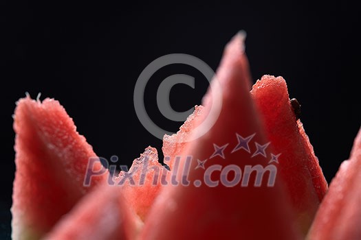 slices of watermelon isolated on black background slices of watermelon isolated on black background
