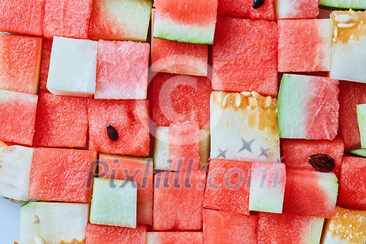 food background from cubes of red watermelon food background from cubes of red watermelon