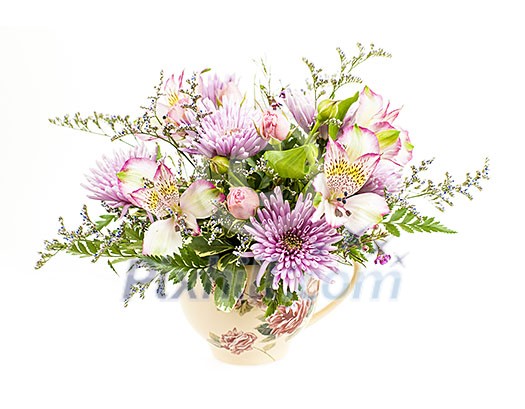 Bouquet of colorful flowers arranged in small vase isolated on white background Bouquet of colorful flowers arranged in small vase isolated on white background