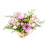 Bouquet of colorful flowers arranged in small vase isolated on white background