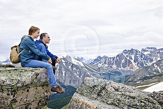 Father and daughter enjoying scenic Canadian Rocky Mountains view in Jasper National park Father and daughter enjoying scenic Canadian Rocky Mountains view in Jasper National park