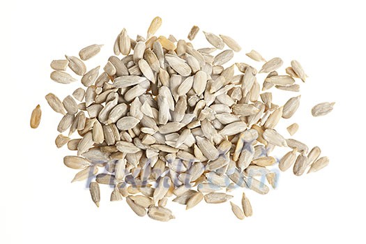 Heap of raw shelled sunflower seeds isolated on white background from above Heap of raw shelled sunflower seeds isolated on white background from above