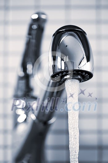 Stainless steel kitchen faucet with running water Stainless steel kitchen faucet with running water