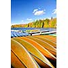 Canoes for rent on fall lake in Algonquin Park, Ontario, Canada