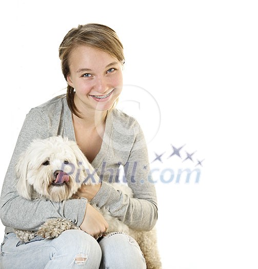 Pretty teenage girl holding adorable coton de tulear dog Pretty teenage girl holding adorable coton de tulear dog