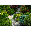 Natural flagstone path landscaping in home garden