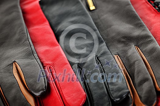 Assorted selection of leather female gloves closeup Assorted selection of leather female gloves closeup