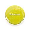 Green round volunteer button isolated on white