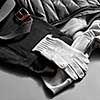 gray warm gloves winter clothes. Clothing background