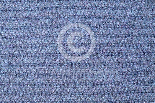 knit texture of blue wool knitted fabric with pattern as background
