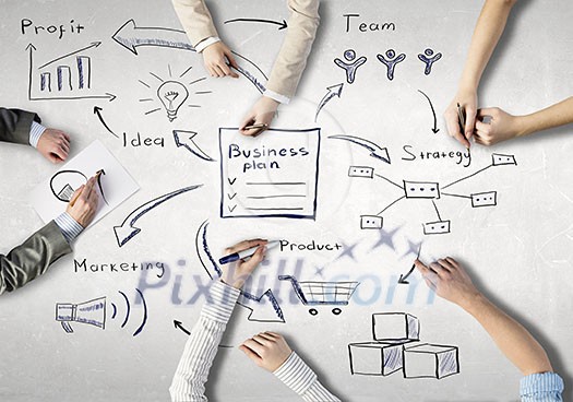 Top view of people hands drawing business teamwork strategy Top view of people hands drawing business teamwork strategy
