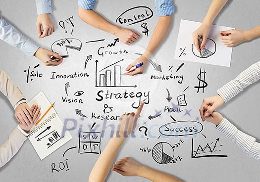 Top view of people hands drawing business teamwork strategy