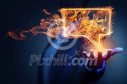 Fire glowing speech bubble icon on dark background Fire glowing speech bubble icon on dark background