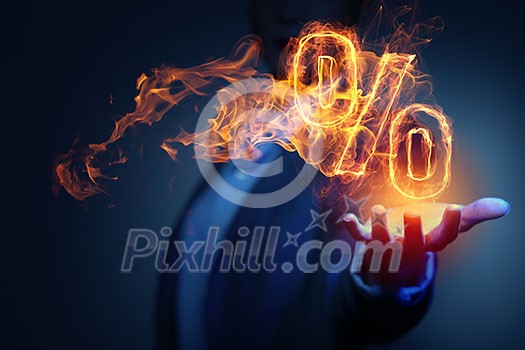 Hand touch percent light glowing symbol on dark background Hand touch percent light glowing symbol on dark background