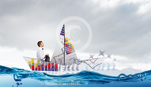 Successful businessman sailing on paper boat in financial sea Successful businessman sailing on paper boat in financial sea