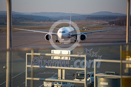 ZURICH - December 3: Planes preparing for take off at the Zurich International Airport (Flughafen Zürich) in Kloten, Switzerland