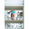 Senior male researcher carrying out scientific research in a lab (shallow DOF; color toned image)