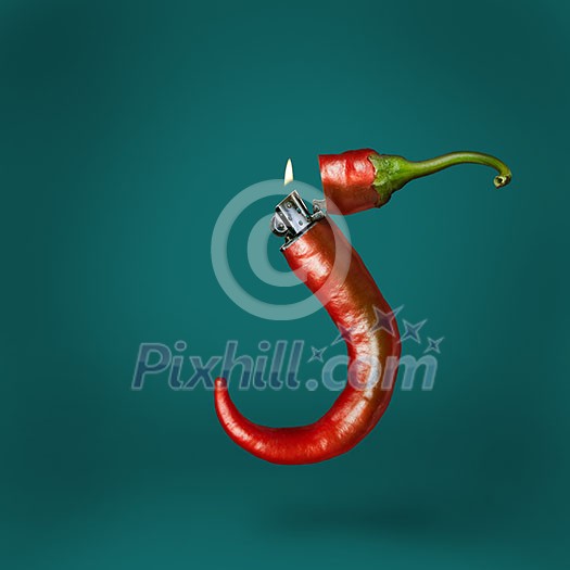 Lighter chili pepper on a green background