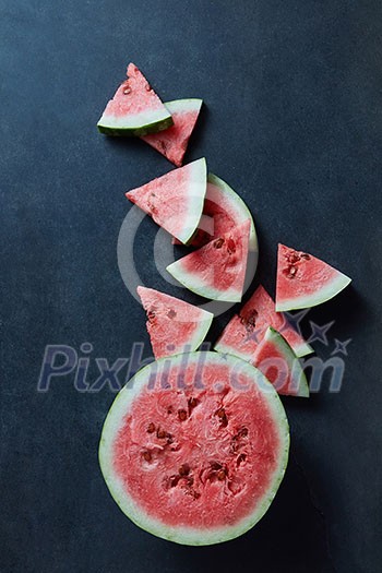 Slice of watermelon on black background